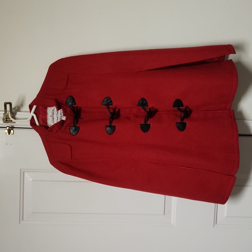 Heart soul fully lined coat with toggle closure. Size medium.
